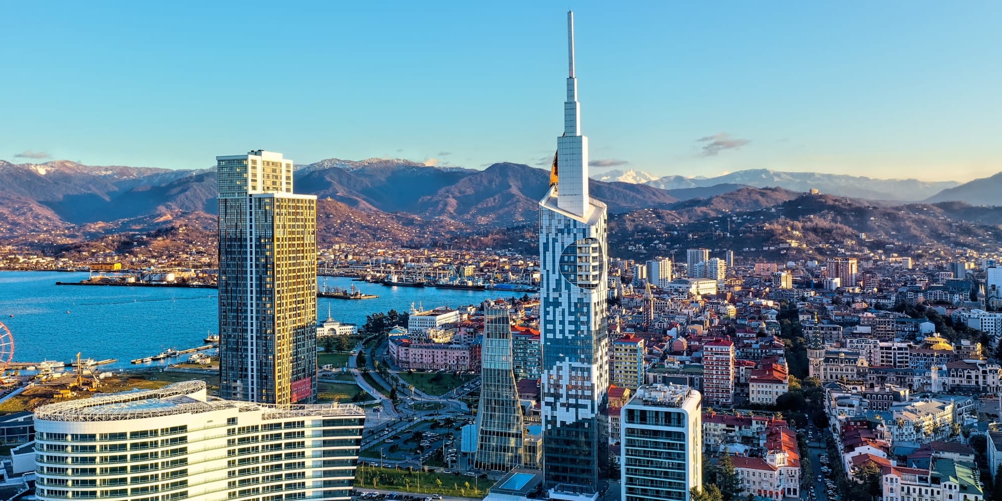 Modern city skyline with highlighted tokenized commercial properties representing fractional real estate ownership in 2025